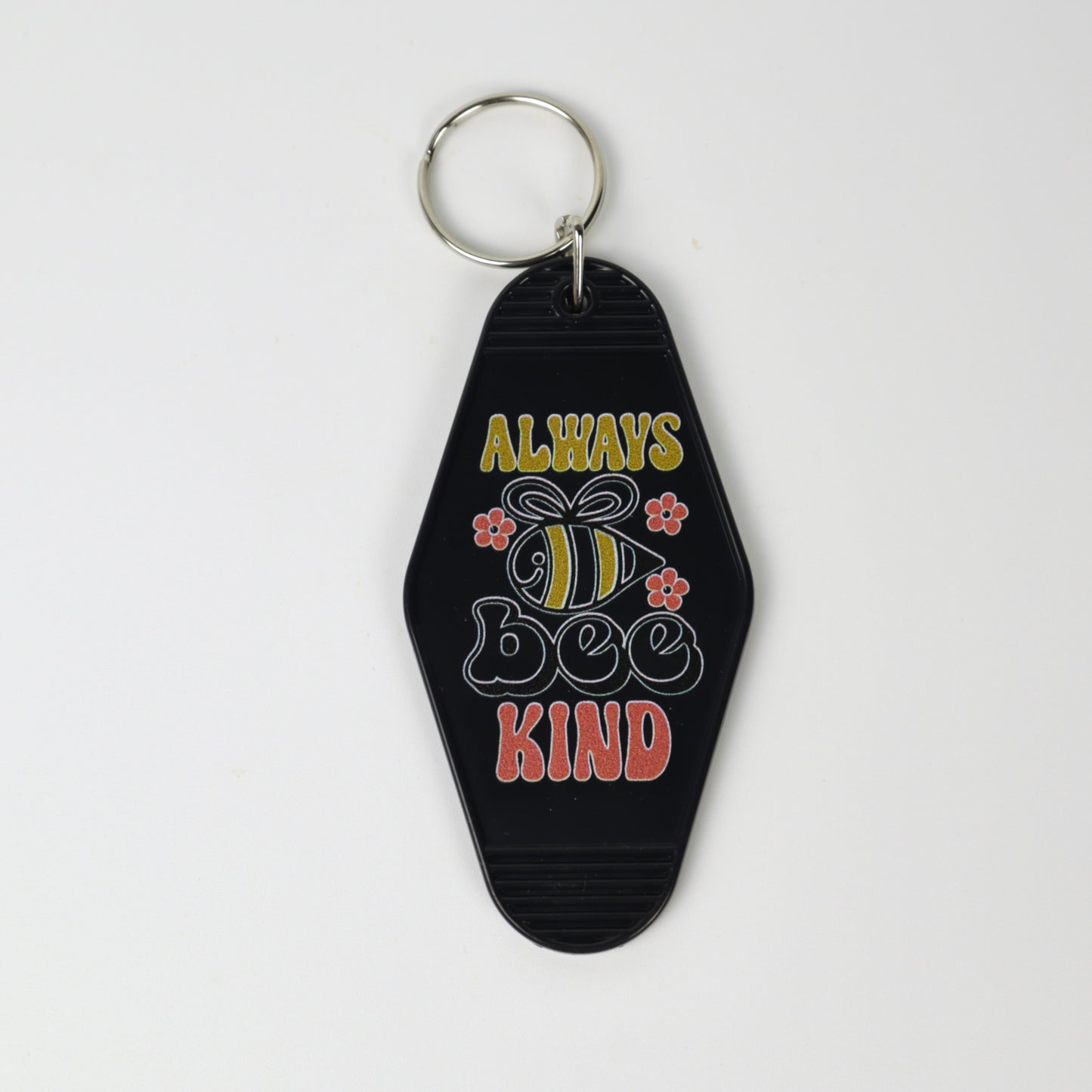Llavero vintage de motel "Bee Kind"
