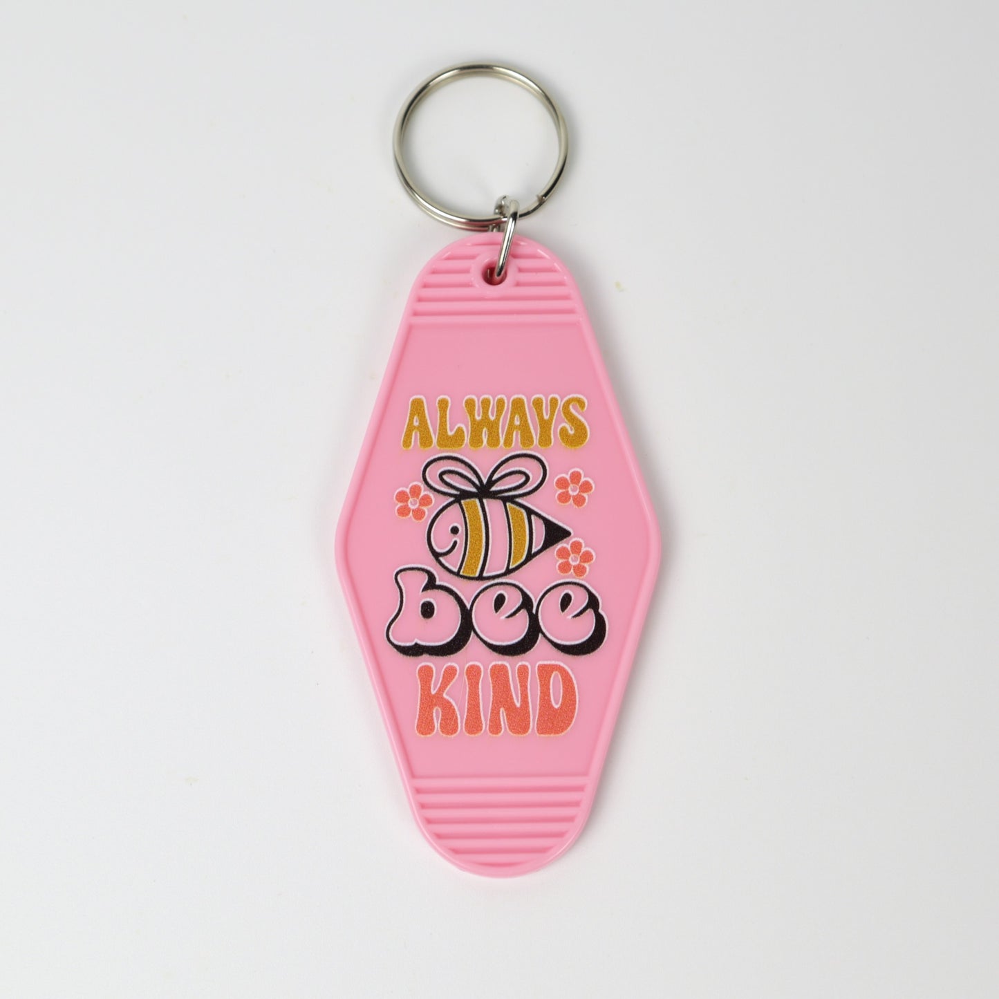 Llavero vintage de motel "Bee Kind"
