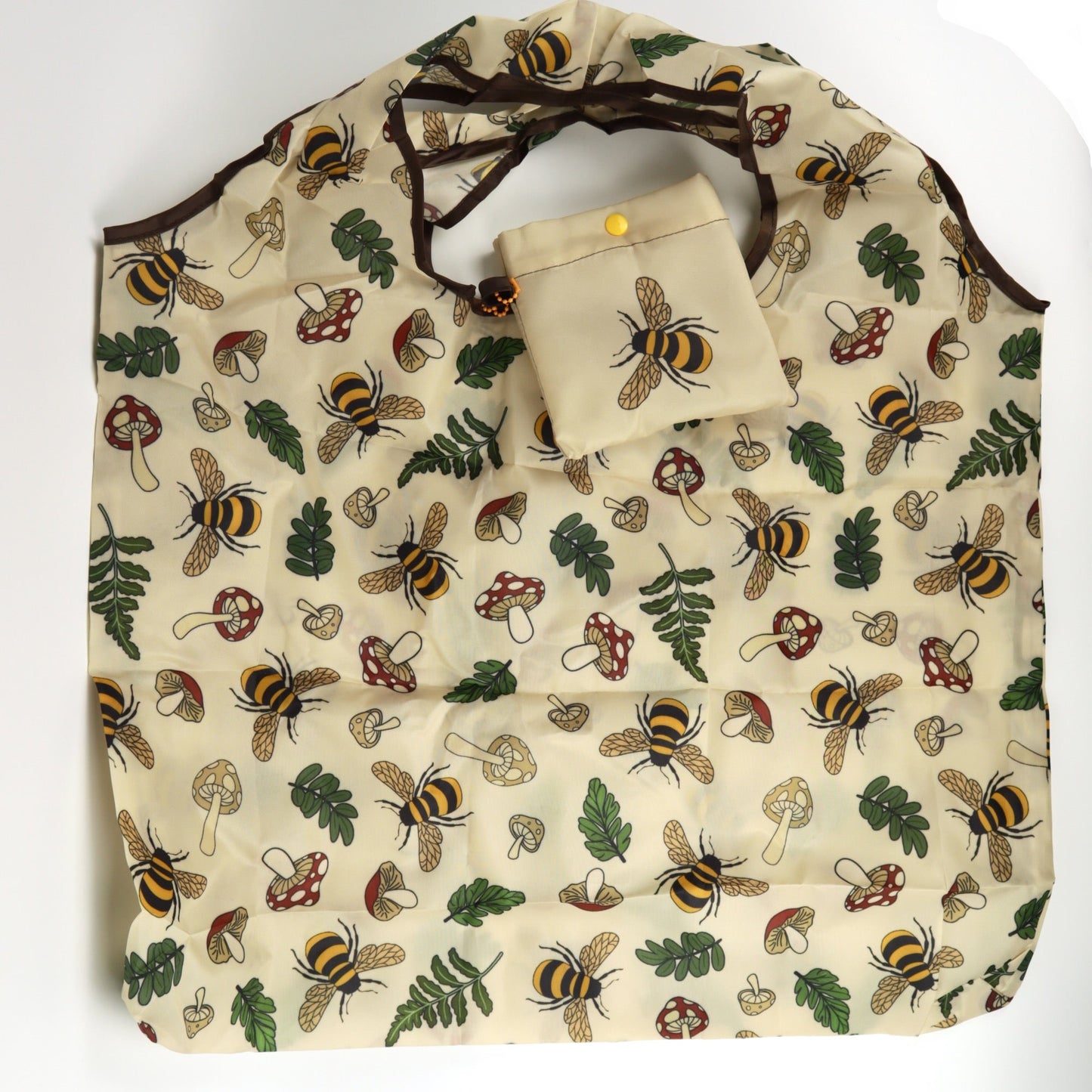 Bees and nature-themed tote bag with matching pouch on a white background
